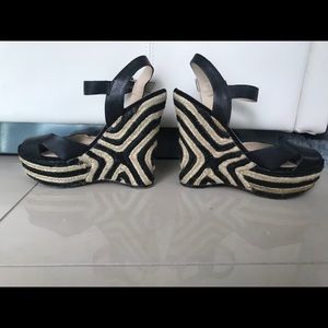 Gently worn beige and black wedges